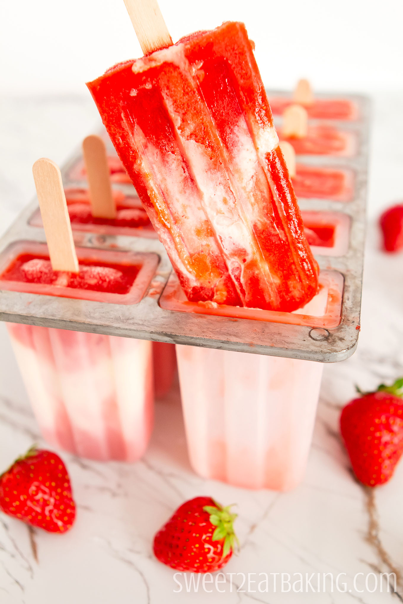 Strawberries and Cream Popsicles Recipe by Sweet2EatBaking.com